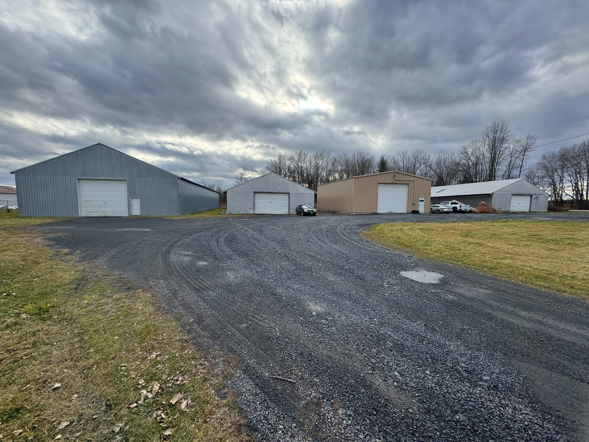 Gravel drive between the Island Storage buildings at 219 Station Road, North Hero, Vermont